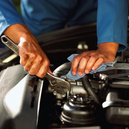 Mechanic repairing car